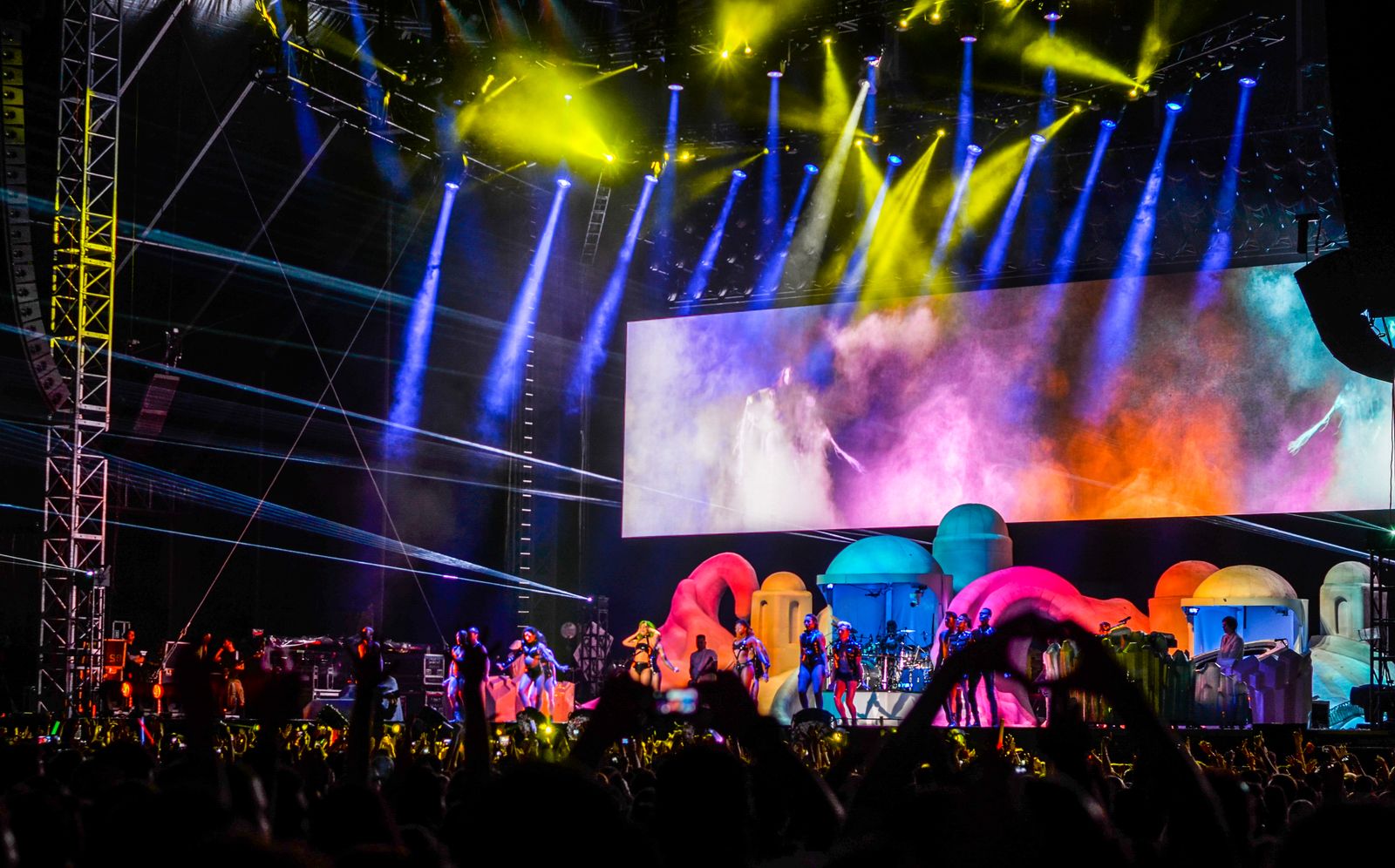 Stage lighting and performers at a live concert; sample photograph by Julia Sakelli